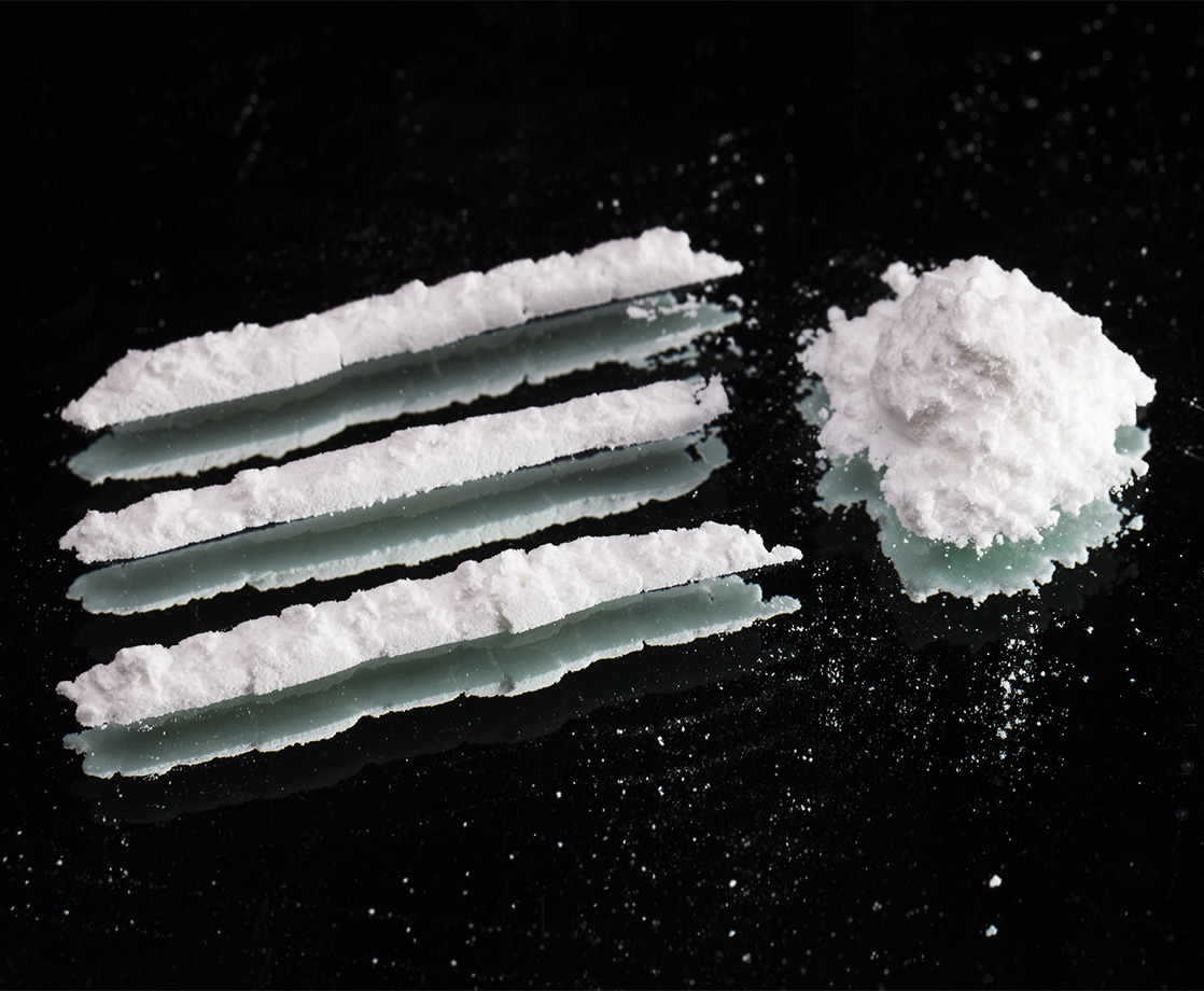 Trapped in a Container Filled with Cocaine, Suspects Call Cops on Themselves