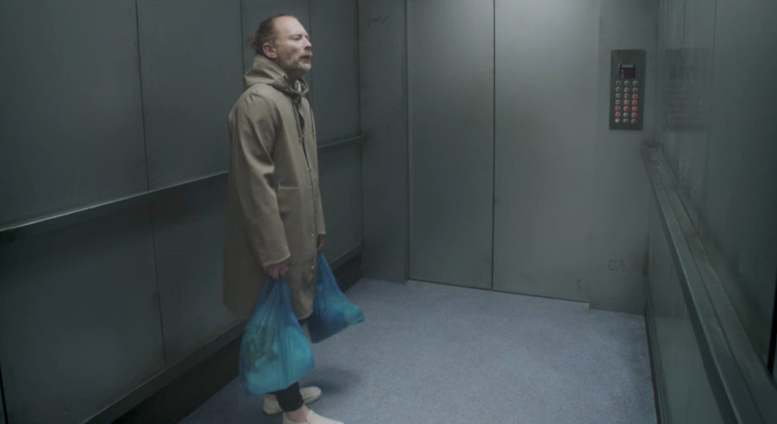 Join Thom Yorke on a Trippy Elevator Ride in Radiohead’s “Lift” Music Video